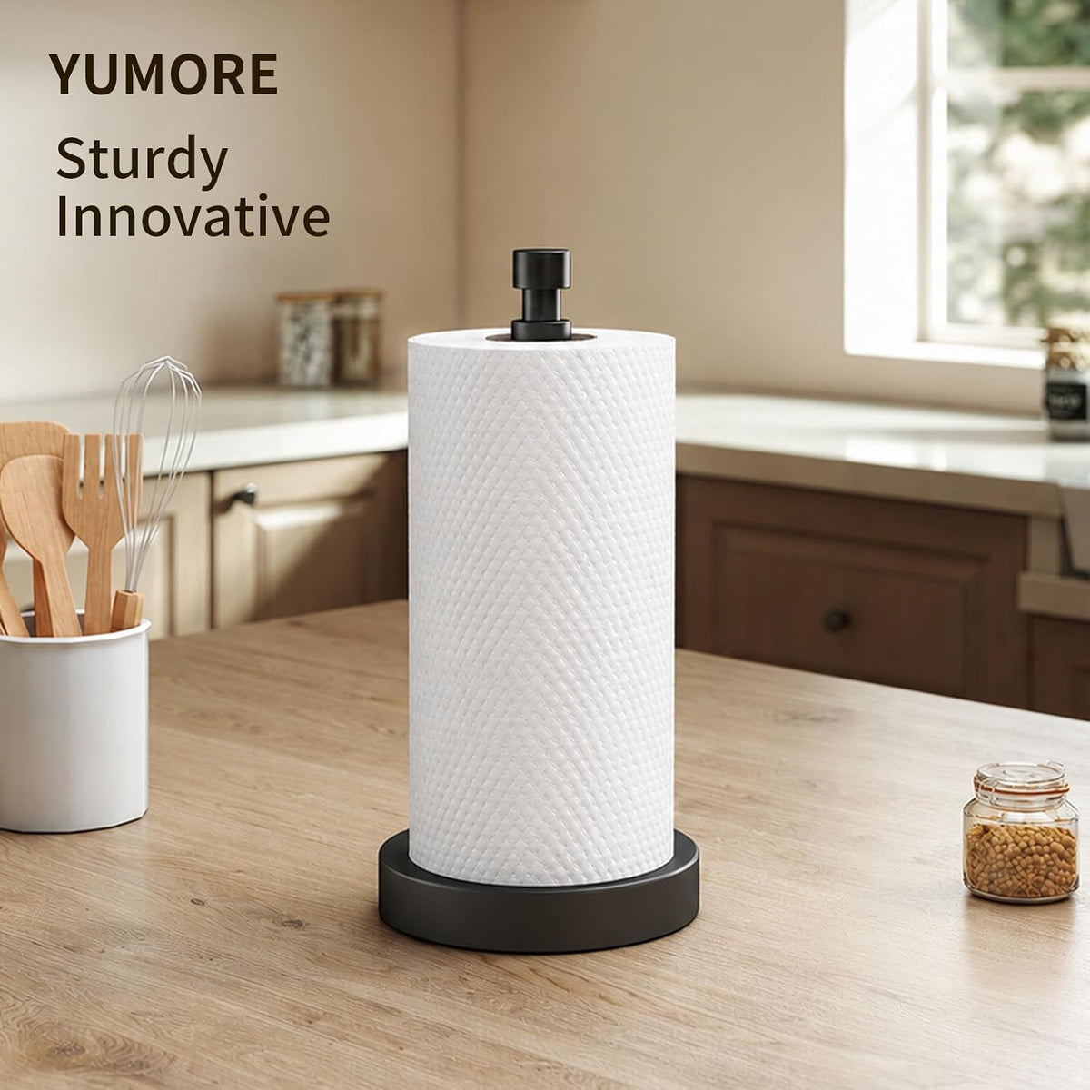 Black paper towel holder on wood kitchen counter; original branded scene